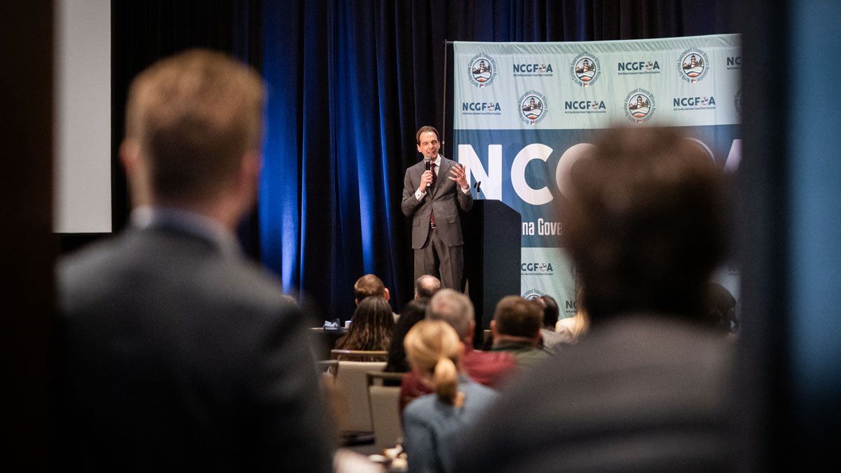 Keynote speakers engaging a live event audience